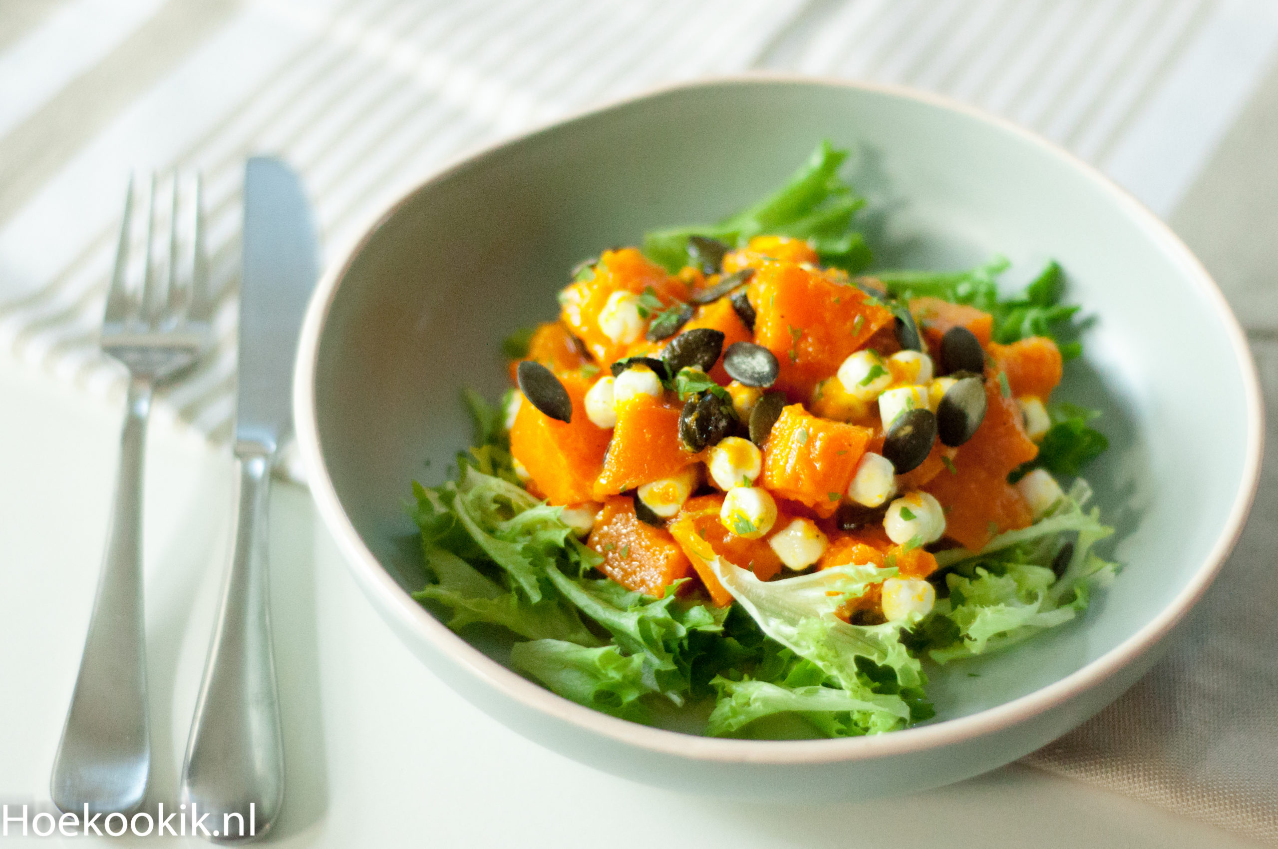 Pompoensalade met geitenkaas en honingdressing